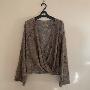 Low cut, long sleeve blouse